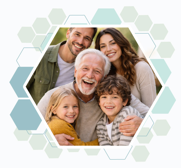 un senior de plus de 65 ans entouré de sa famille et ses petits enfants